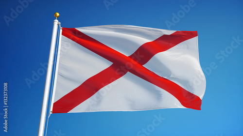 Alabama (U.S. state) flag waving against clear blue sky, close up, isolated with clipping path mask alpha channel transparency, perfect for film, news, composition photo