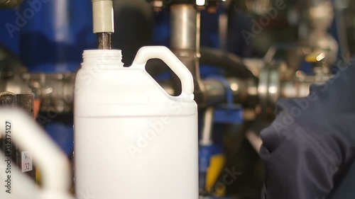 A canister with a dangerous liquid at the plant