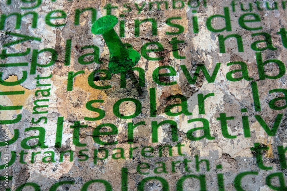 Fototapeta premium Renewable energy text on wall
