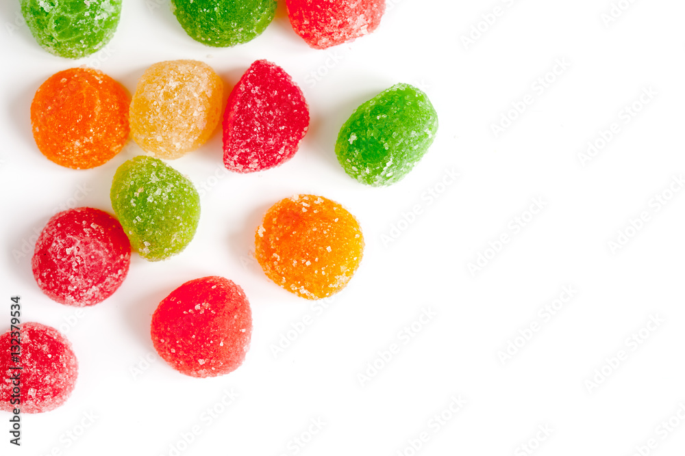 sweets and sugar candies on white background top view sweets and sugar candies on white background top view