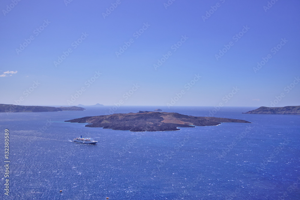 Ship sailing in blue sea near Santorini volcano. Greek travel poster..