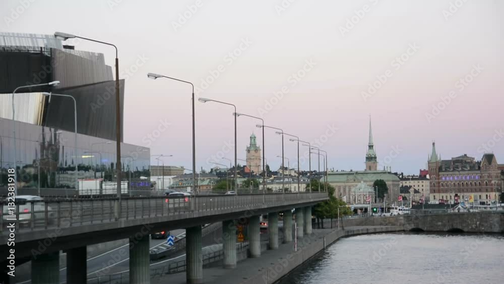 Central Bridge and water canal in Stockholm. Traffic and cityscape Central Bridge and water canal in Stockholm. Traffic and cityscape