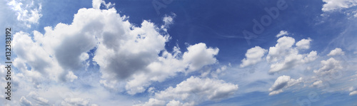 Blue sky cloudscape as background. Horizontal.