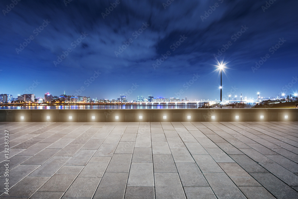 cityscape and skyline of modern city at night from floor