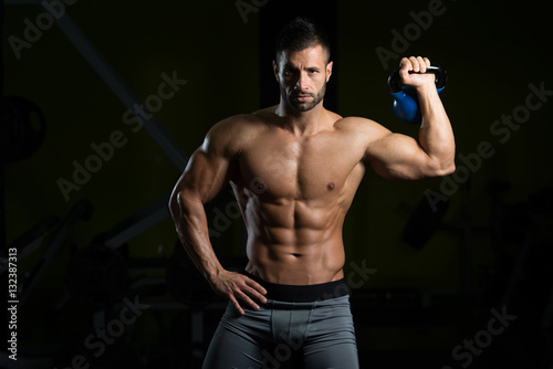 Portrait Of A Physically Fit Man With Kettle-bell