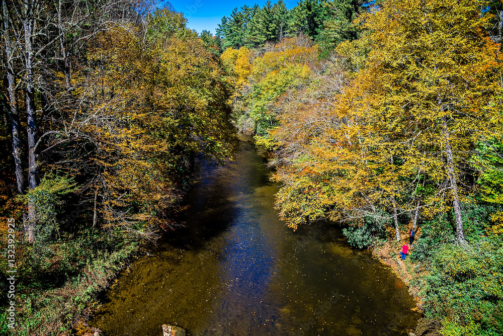 mountain river and fall foliage in the Appalachians of western N