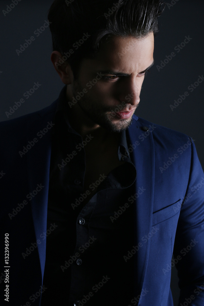 Elegant handsome man. Studio fashion portrait.