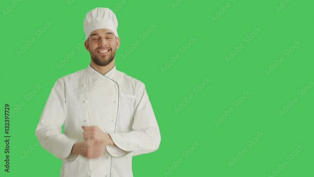 Mid Shot of a Handsome Chef making Presenting Gesture. Background is Green Screen. Shot on RED Cinema Camera 4K (UHD). Mid Shot of a Handsome Chef making Presenting Gesture. Background is Green Screen. Shot on RED Cinema Camera 4K (UHD).