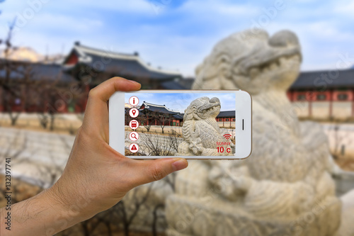 Application of Artificial Intelligence, AI, and Augmented Reality, AR, in Traveling and Tourism Business Concept