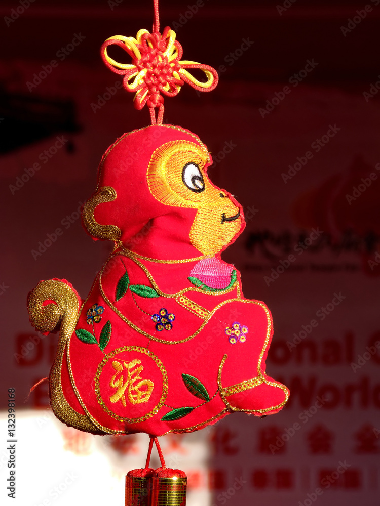 Chinese monkey pendant with Chinese character meaning blessing on Spring Festival