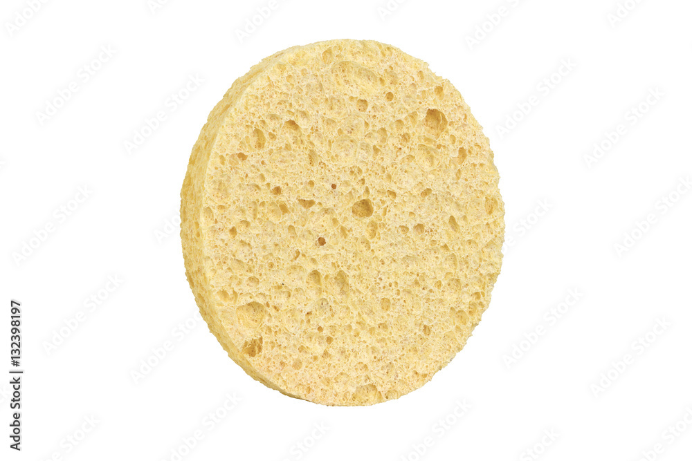 Beige round cosmetic sponge pad for face make-up cleaning, side view, isolated on white background, clipping path included Beige round cosmetic sponge pad for face make-up cleaning, side view, isolated on white background, clipping path included