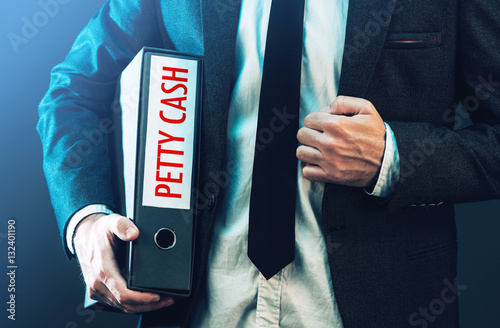 Tracking petty cash with businessman and ring binder