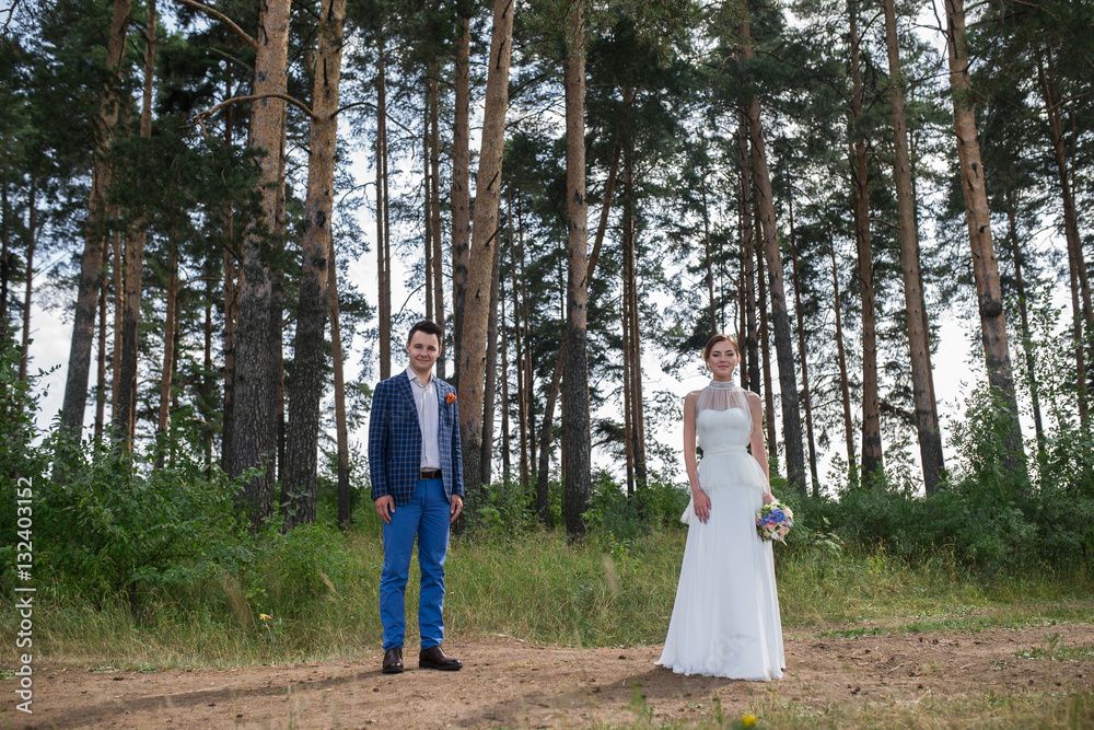Fototapeta premium beautiful young bride and groom