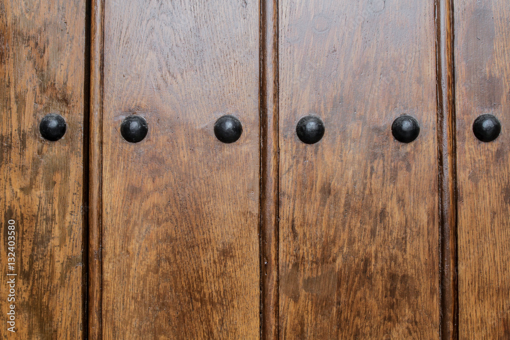Bucharest, Romania, January 31, 2016: Pattern - Decorative wooden elements with rivets. Bucharest, Romania, January 31, 2016: Pattern - Decorative wooden elements with rivets.