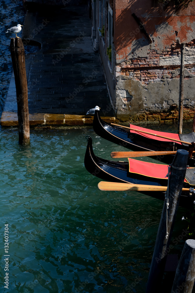 Gondolas bows in Venice in Italy