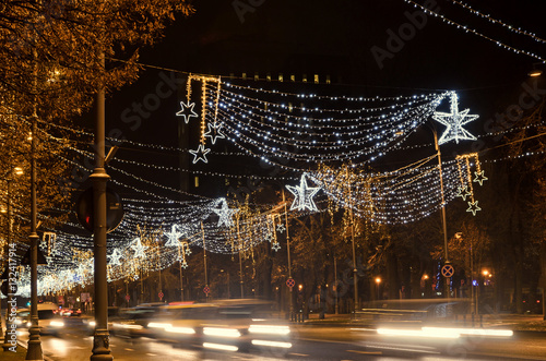 Colored Christmas lights and ornaments  stars and snowflakes in downtown of Bucharest