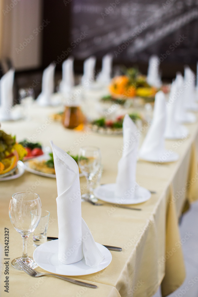 Banquet wedding table setting on evening reception