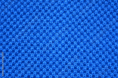 Fotografie beautiful blue bright knitted warm dense fabric, pattern, texture, background