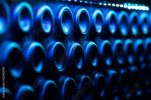 many blue wine bottles