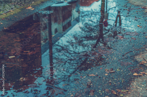 Fototapeta Naklejka Na Ścianę i Meble -  puddle on a cold day with reflections