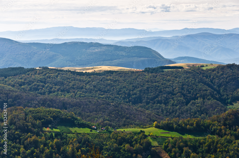 Landscape of mount Bobija, peaks, hills, meadows and colorful forests, west Serbia