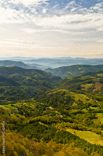 Viewpoint on a landscape of mount Bobija  peaks  hills  meadows and green forests  west Serbia