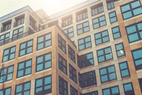 modern architectured office buildings with sunlight on the top