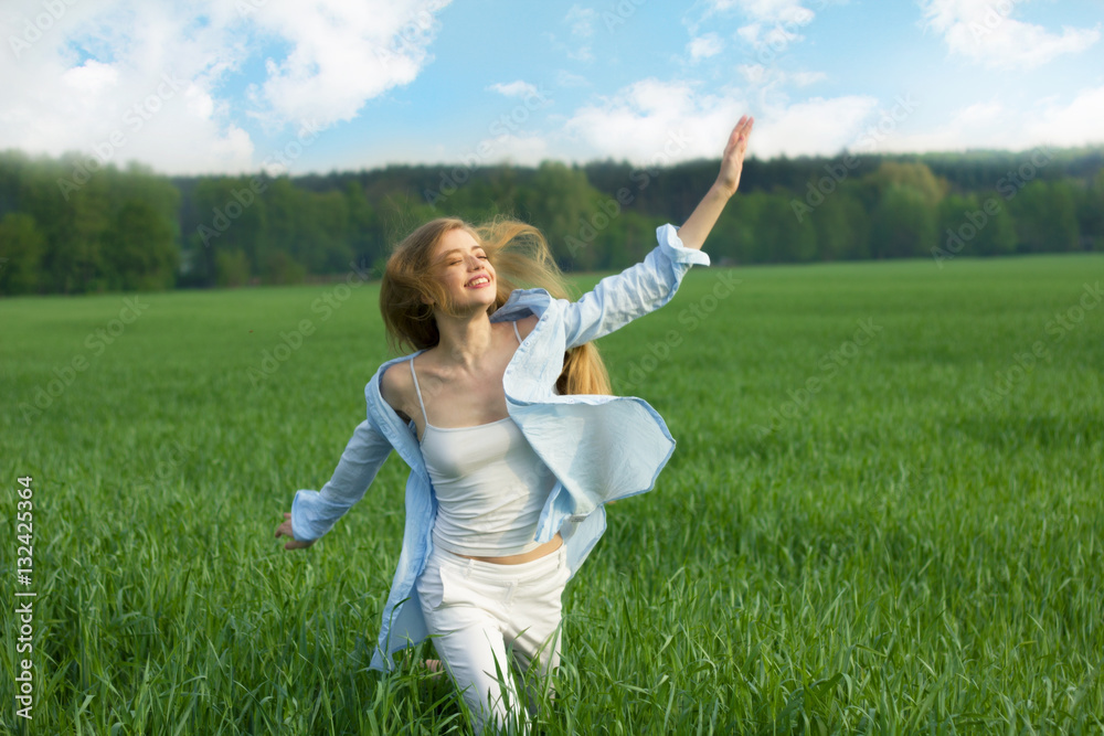 Women is running on the green field. Women is running on the green field.
