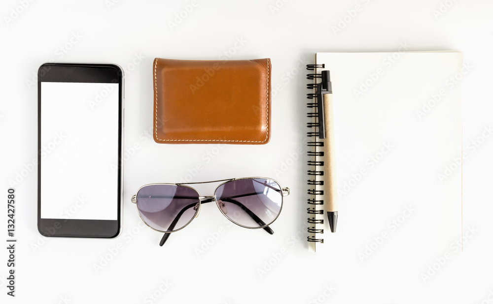 Office workspace with keyboard pen and smartphone on white background.Top view, copy space Office workspace with keyboard pen and smartphone on white background.Top view, copy space