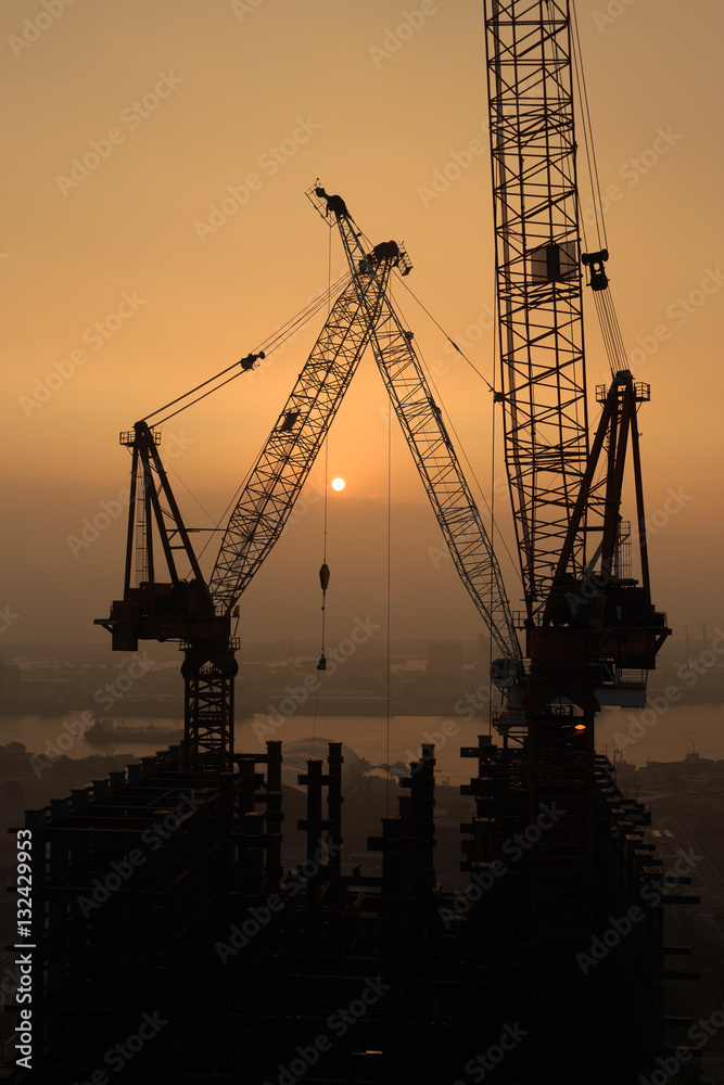 The construction of building in the sunset