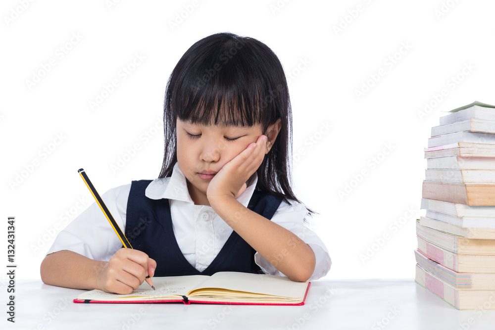 Boring Asian Chinese little girl wearing school uniform studying Boring Asian Chinese little girl wearing school uniform studying