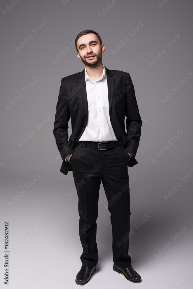 Full height Young businessman in suit  isolated