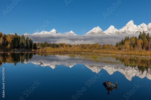 Reflection of the Snow Capped Tetons in Fall