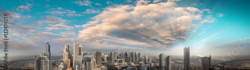 Aerial panoramic view of Dubai Marina skyscrapers at sunset