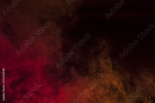 Red smoke in a dark room. Texture, background 