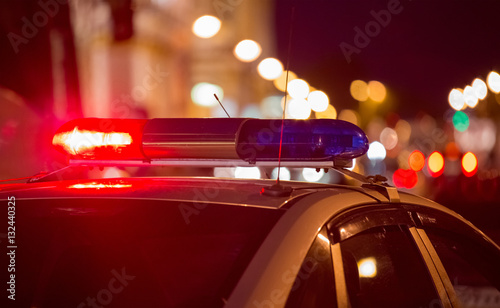Slika na platnu Red light flasher atop of a police car