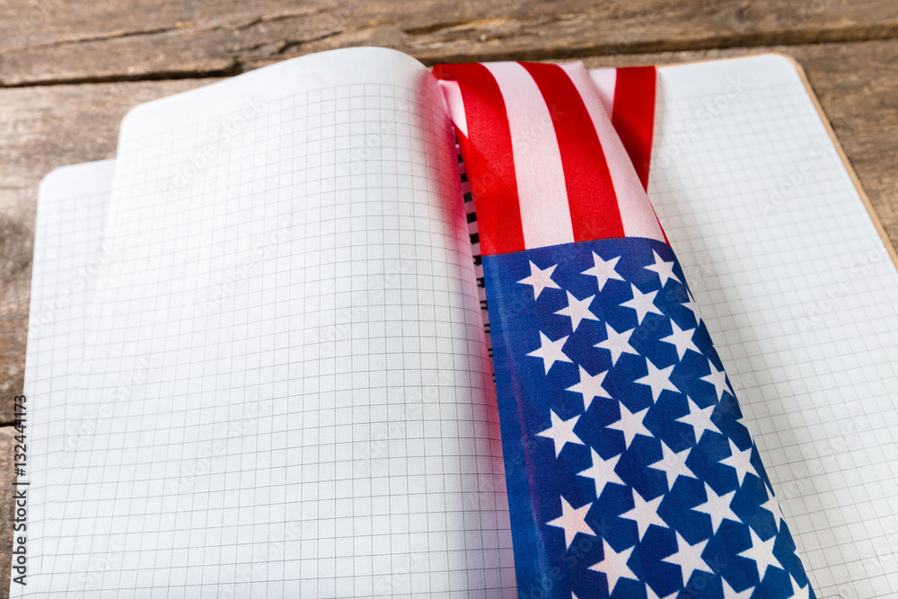 Fototapeta premium open book on American flag