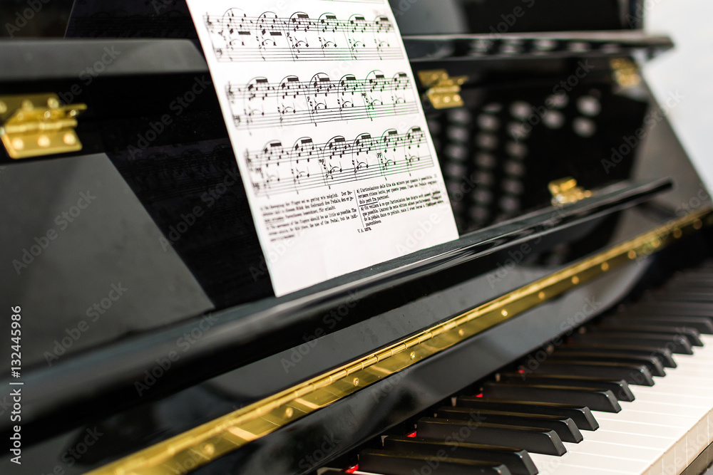 Fototapeta premium Piano with music sheet