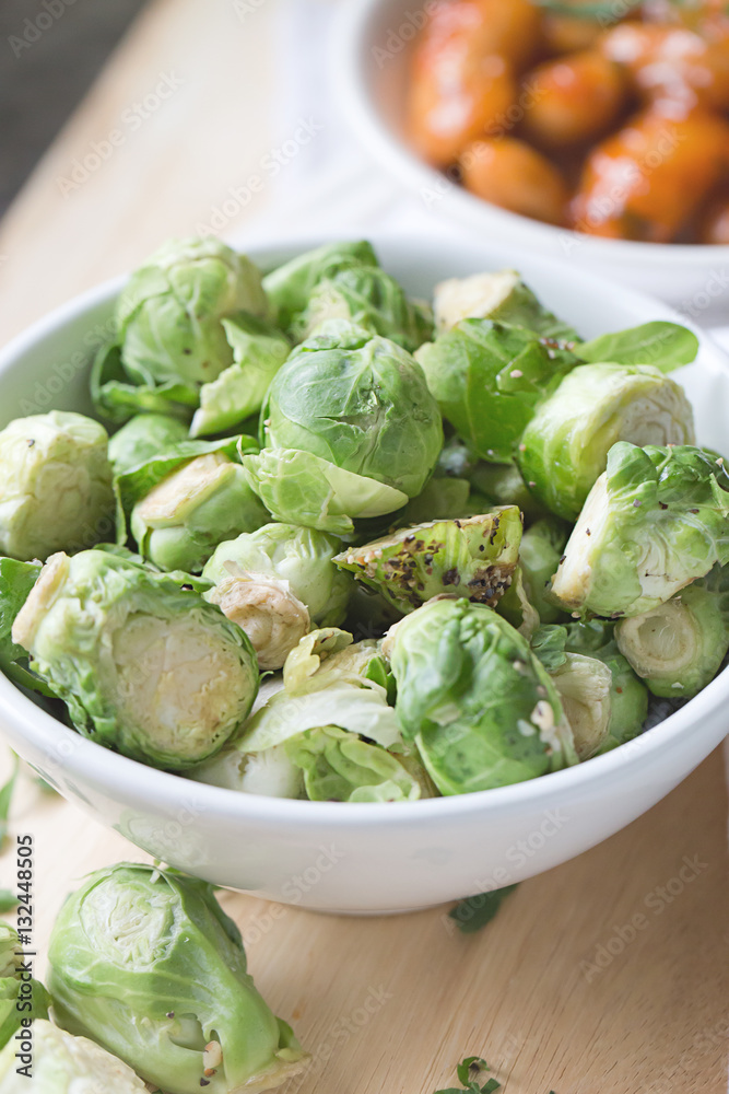 a white bowl of brussells sprouts a white bowl of brussells sprouts
