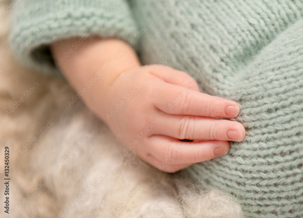 lovely little hand of newborn baby, closeup lovely little hand of newborn baby, closeup
