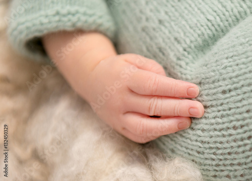lovely little hand of newborn baby, closeup