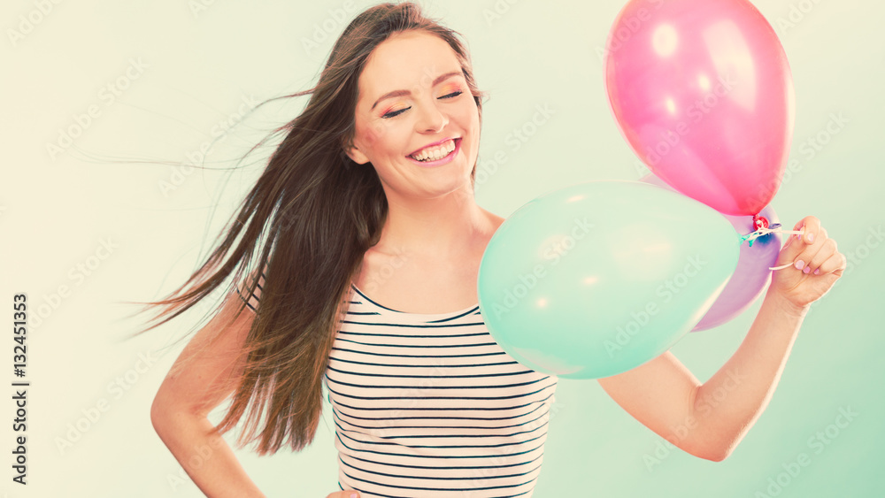 Woman summer joyful girl with colorful balloons Woman summer joyful girl with colorful balloons