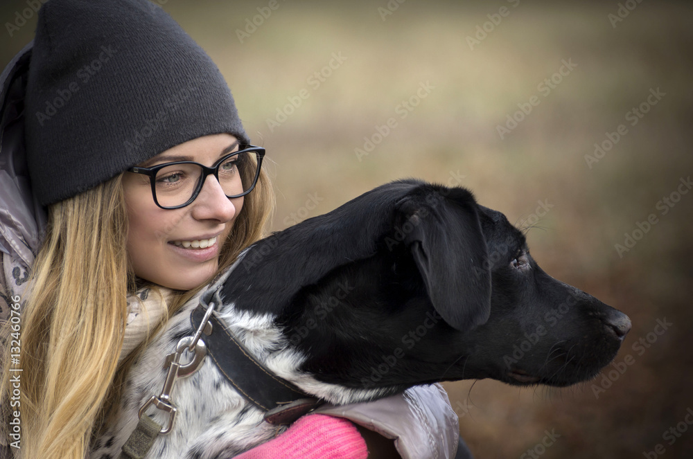 Beautiful girl with a dog on a walk. Beautiful girl with a dog on a walk.