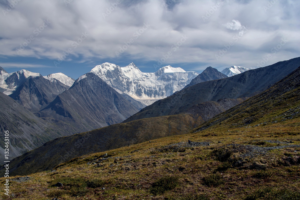 View from the highland pass Karaturek to the Altai Mountains with snowcaps View from the highland pass Karaturek to the Altai Mountains with snowcaps