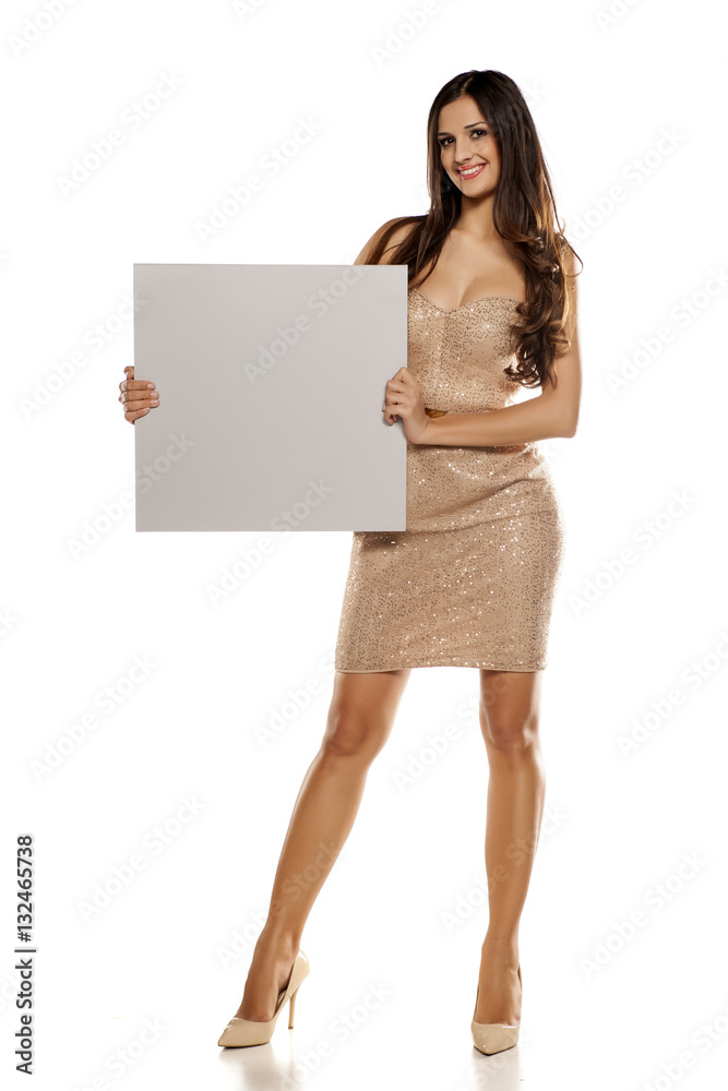 Advertising pretty woman in a short dress on white background Advertising pretty woman in a short dress on white background