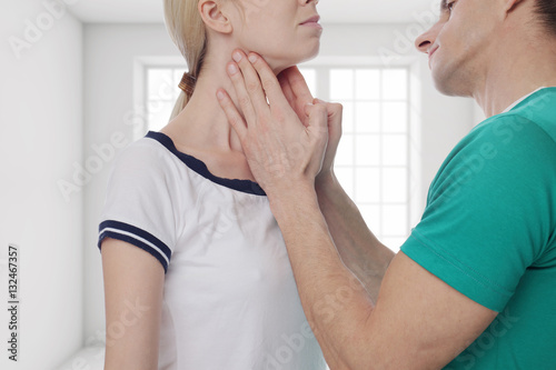 Woman getting thyroid gland control. Health care and medical concept