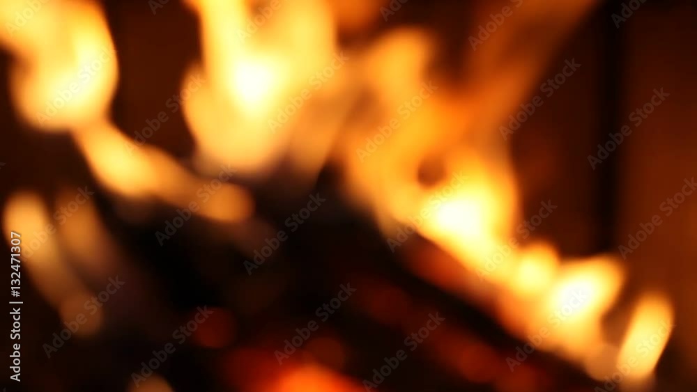 Burning fire In the fireplace. Abstract blurred fire background