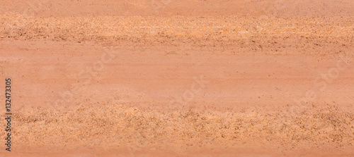 brown wet surface of country road