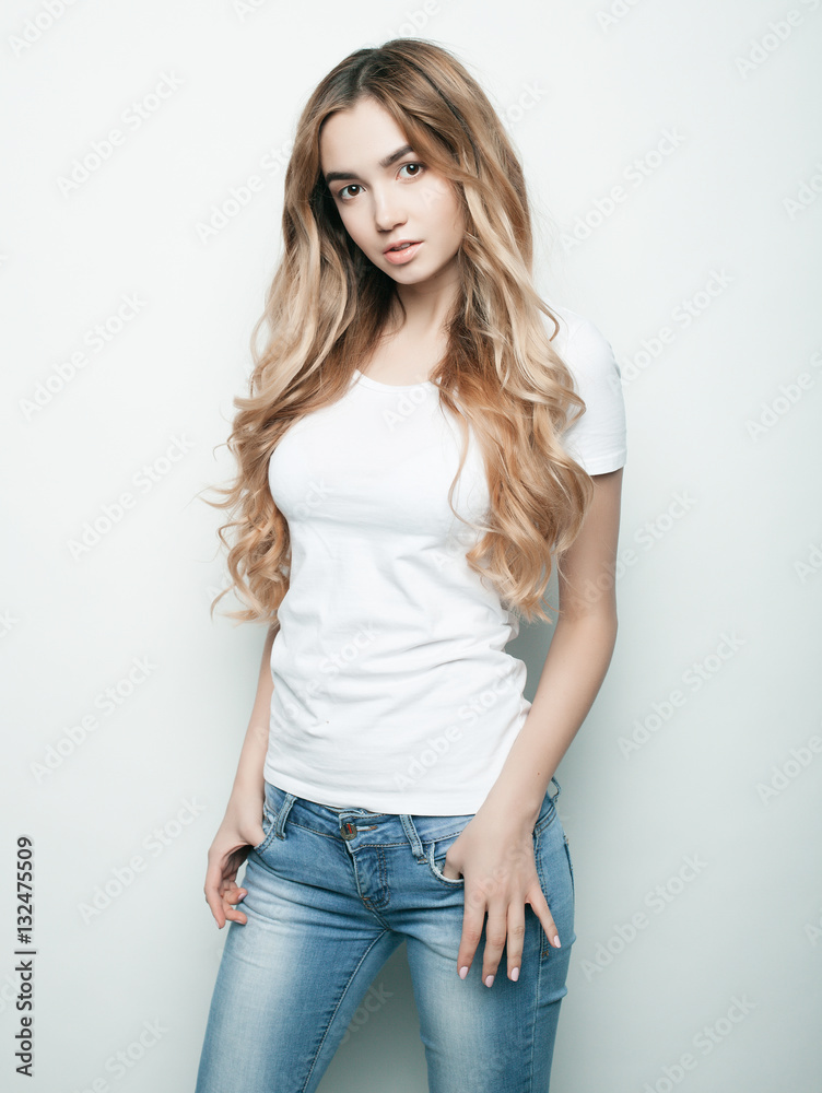 lifestyle and people concept: Young cute smiling curly girl