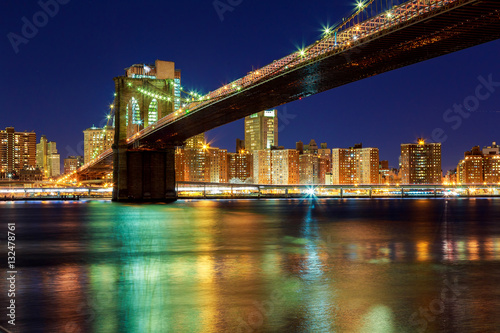 Fototapeta Naklejka Na Ścianę i Meble -  New York City - beautiful sunset over manhattan with  and brooklyn bridge